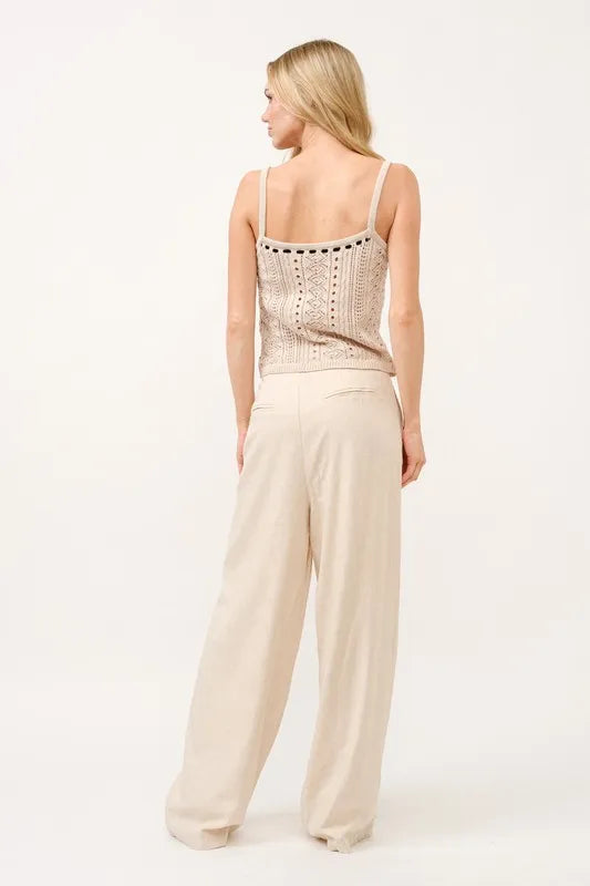 High-rise wide-leg linen-blend pants in oatmeal, back view showing relaxed legs
