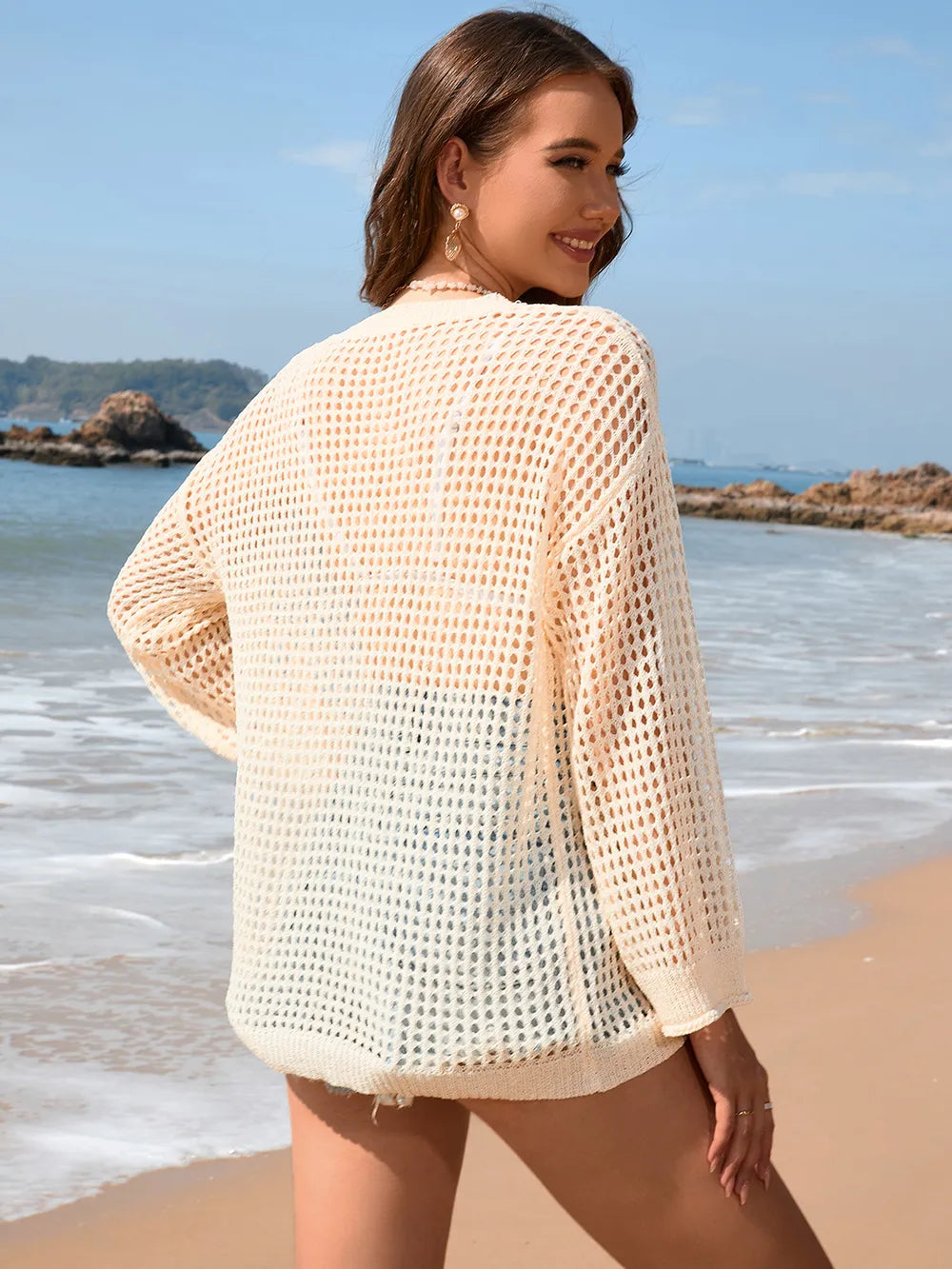 White openwork long-sleeve cover-up with dropped shoulders, back view