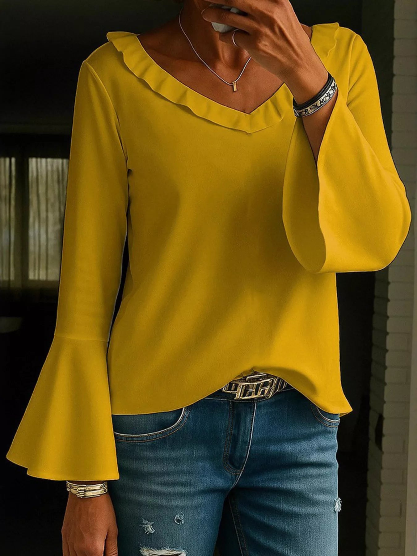 Ochre yellow ruffle V-neck blouse with bell sleeves