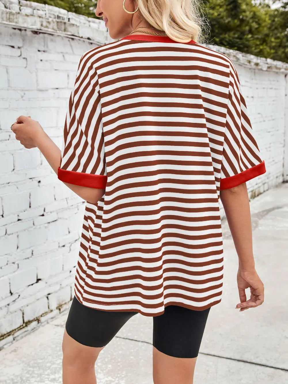 Striped round-neck half-sleeve T-shirt in white with brown stripes and red trim, back view