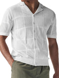 Ivory button-down eyelet checkered knit shirt with short sleeves and front buttons