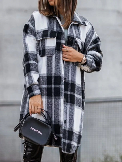 Black/white plaid flannel shacket with collared neck, long sleeves, button front