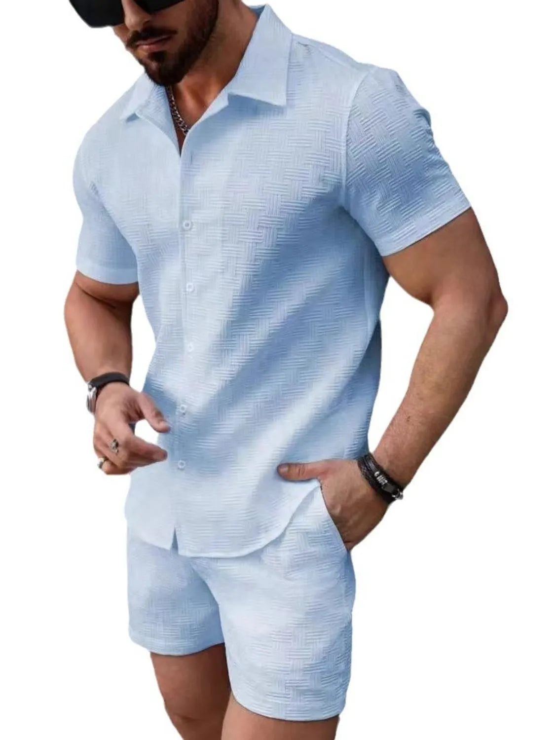 Light blue short-sleeve button-up shirt and matching shorts set with open collar