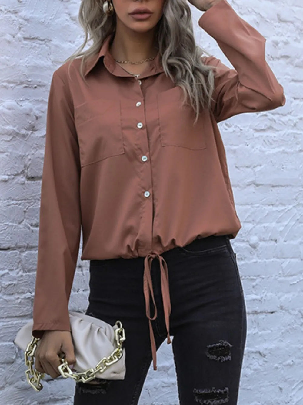 Caramel long-sleeve button down shirt with tied hem and chest pocket, button front