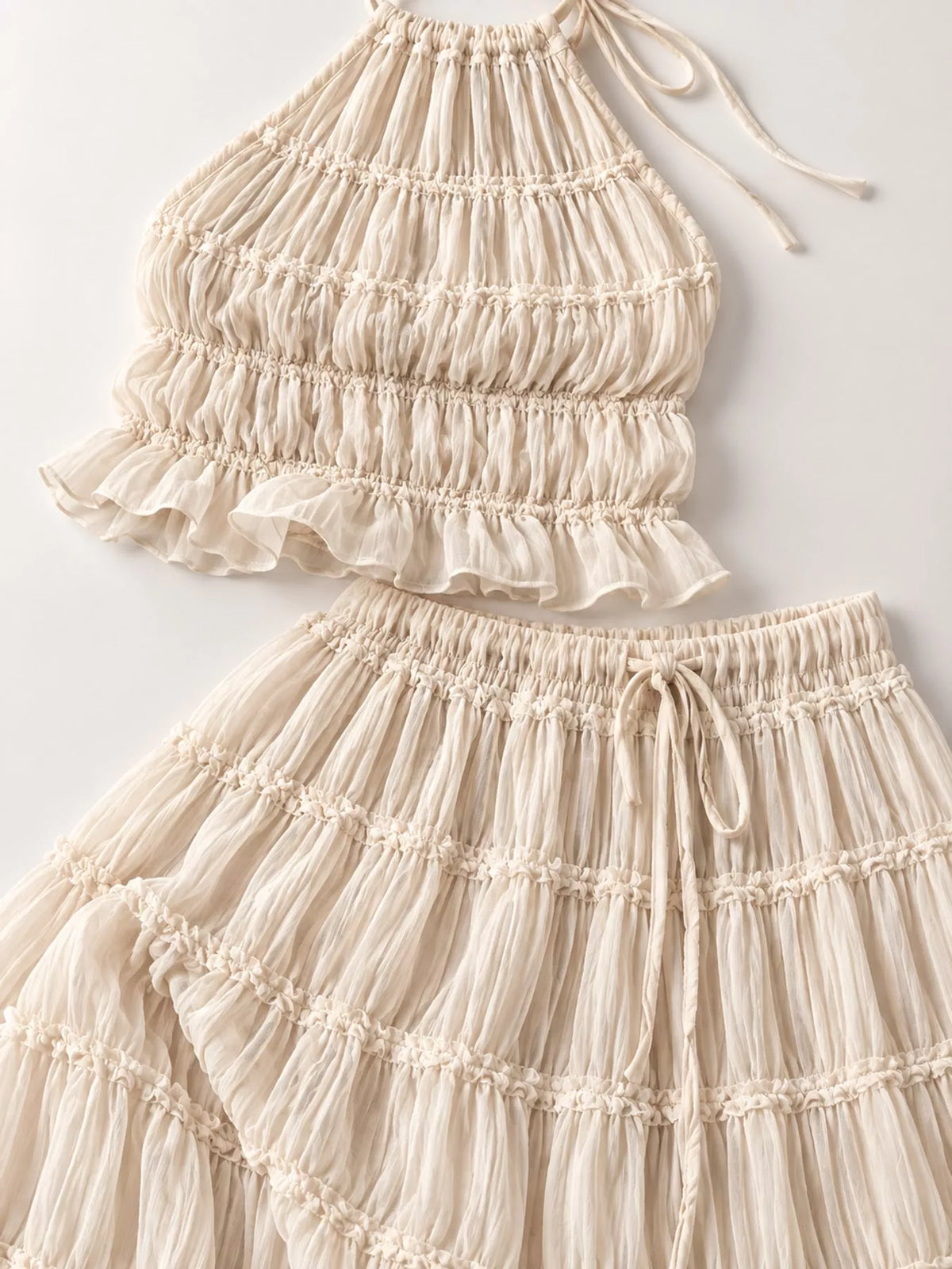 Milky white ruffled halter crop top with ties and tiered maxi skirt