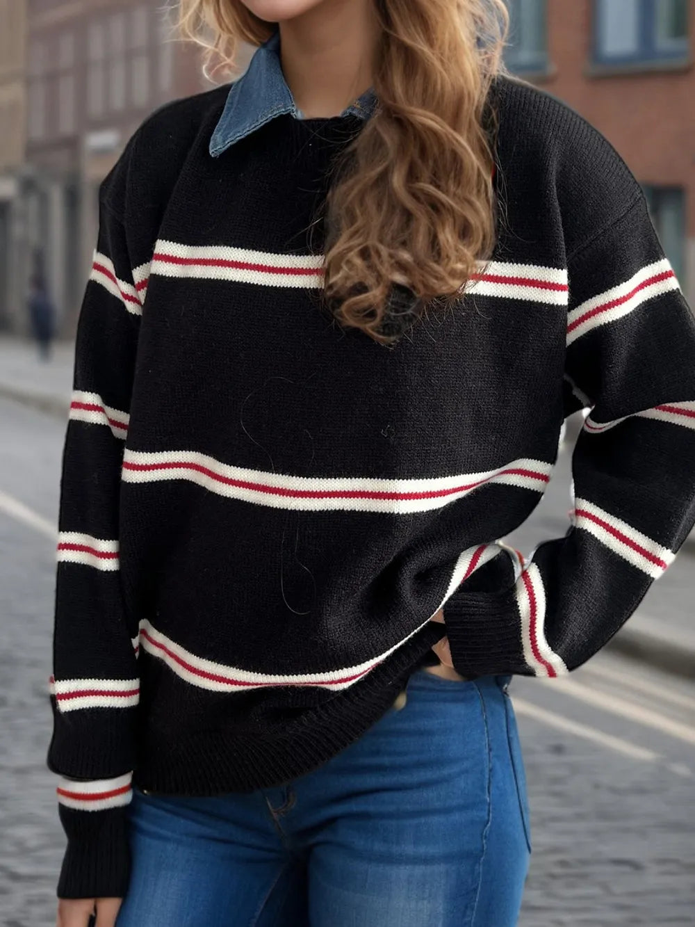 Black round-neck long-sleeve sweater with red and white horizontal stripe bands
