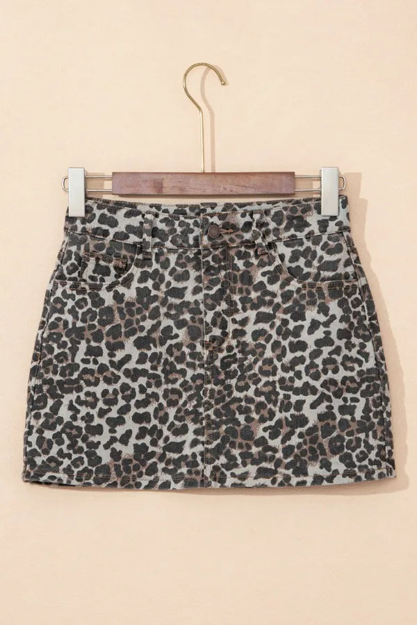 Leopard-print denim mini skirt, front view on hanger