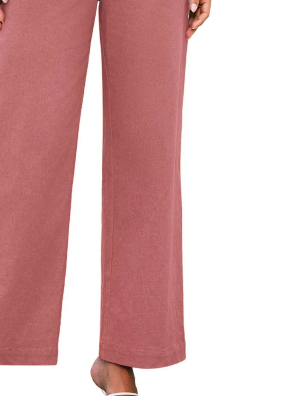 Dusty pink wide-leg pants with high waist and side pockets