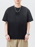 Black men’s plus-size round-neck short-sleeve T-shirt with front graphic