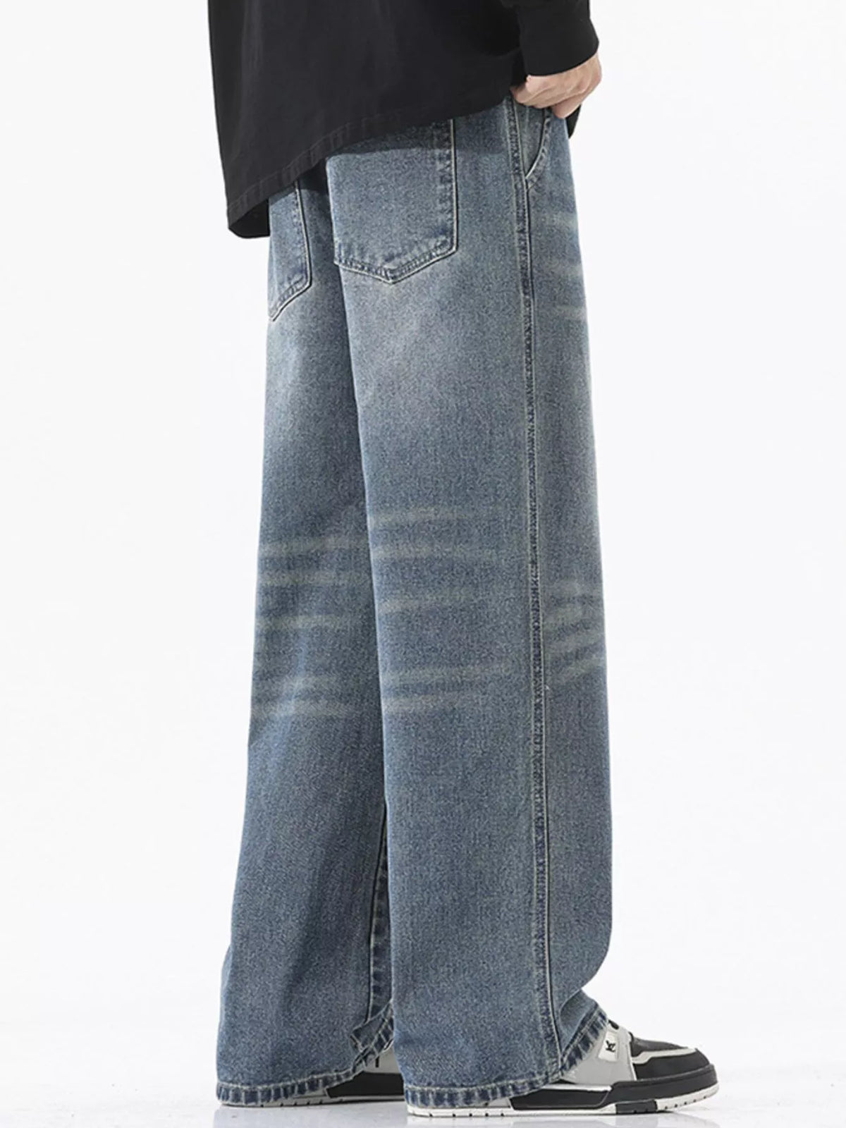 Men's vintage blue wide-leg jeans with front patch pocket and long straight legs