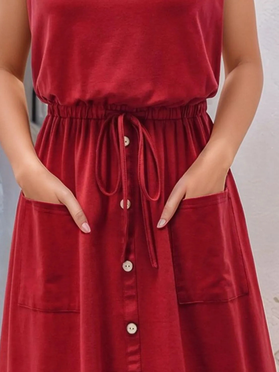 Full Size Round Neck Sleeveless Tank Dress Plus Size by Trendsi in red with drawstring waist and front pockets
