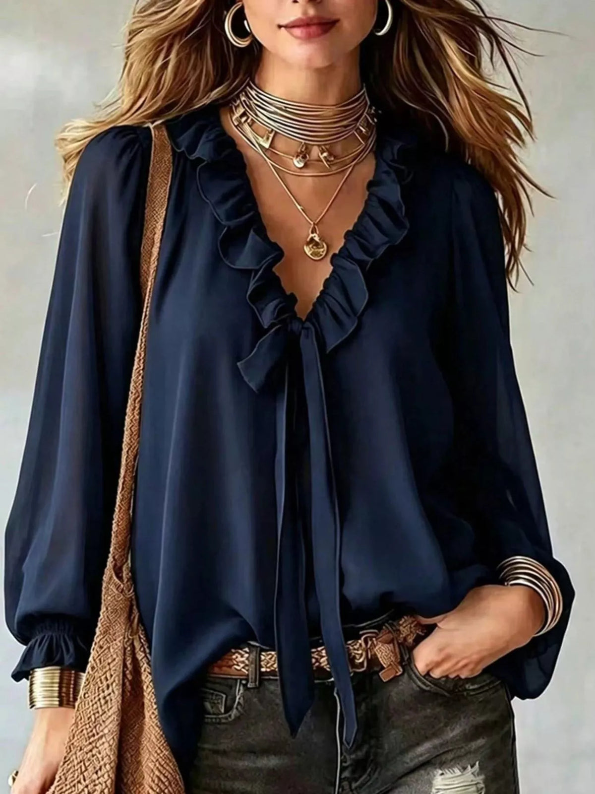 Dark blue ruffle-trim V-neck blouse top with front tie and long cuffed sleeves