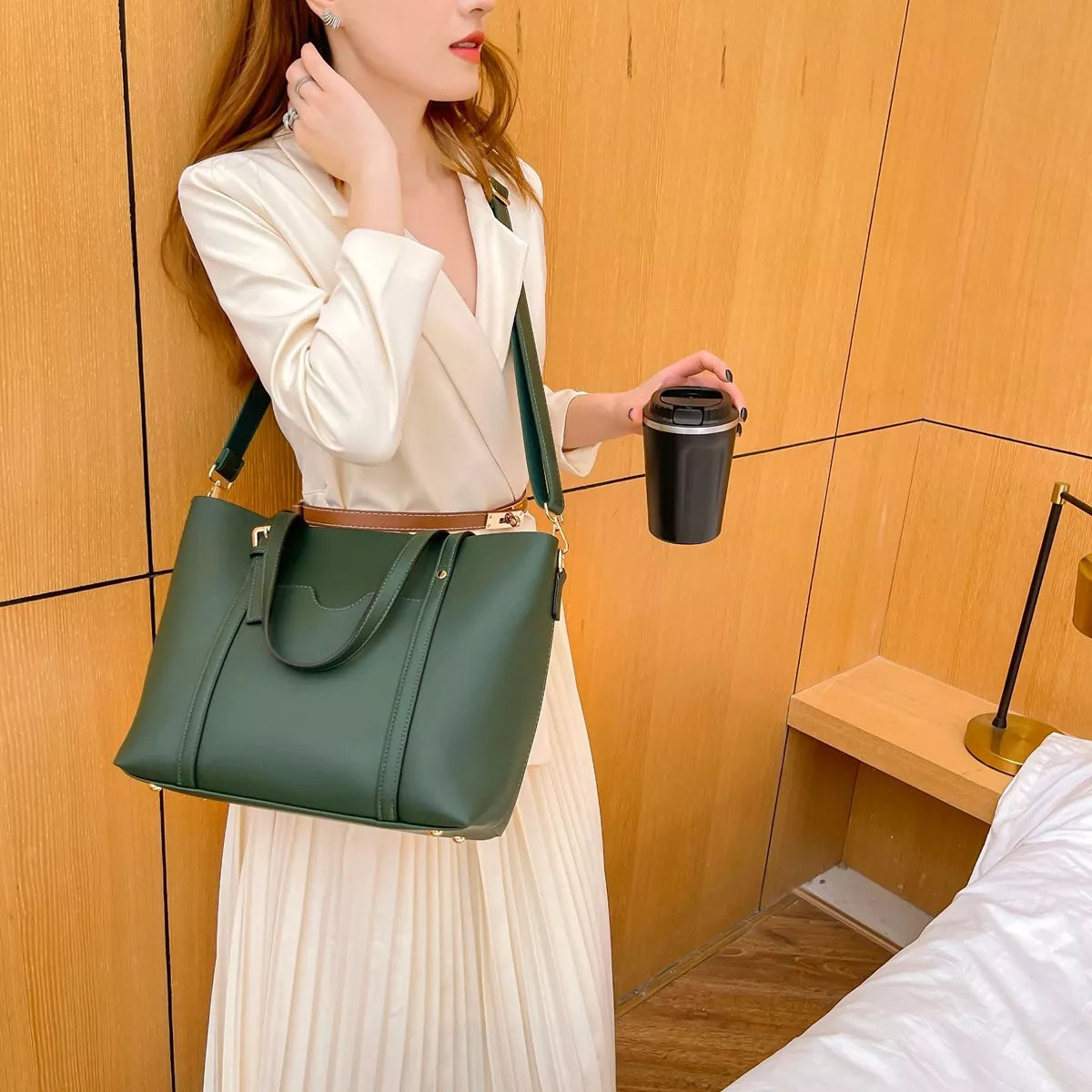 Green medium vegan leather tote bag with front pocket and crossbody strap for carry