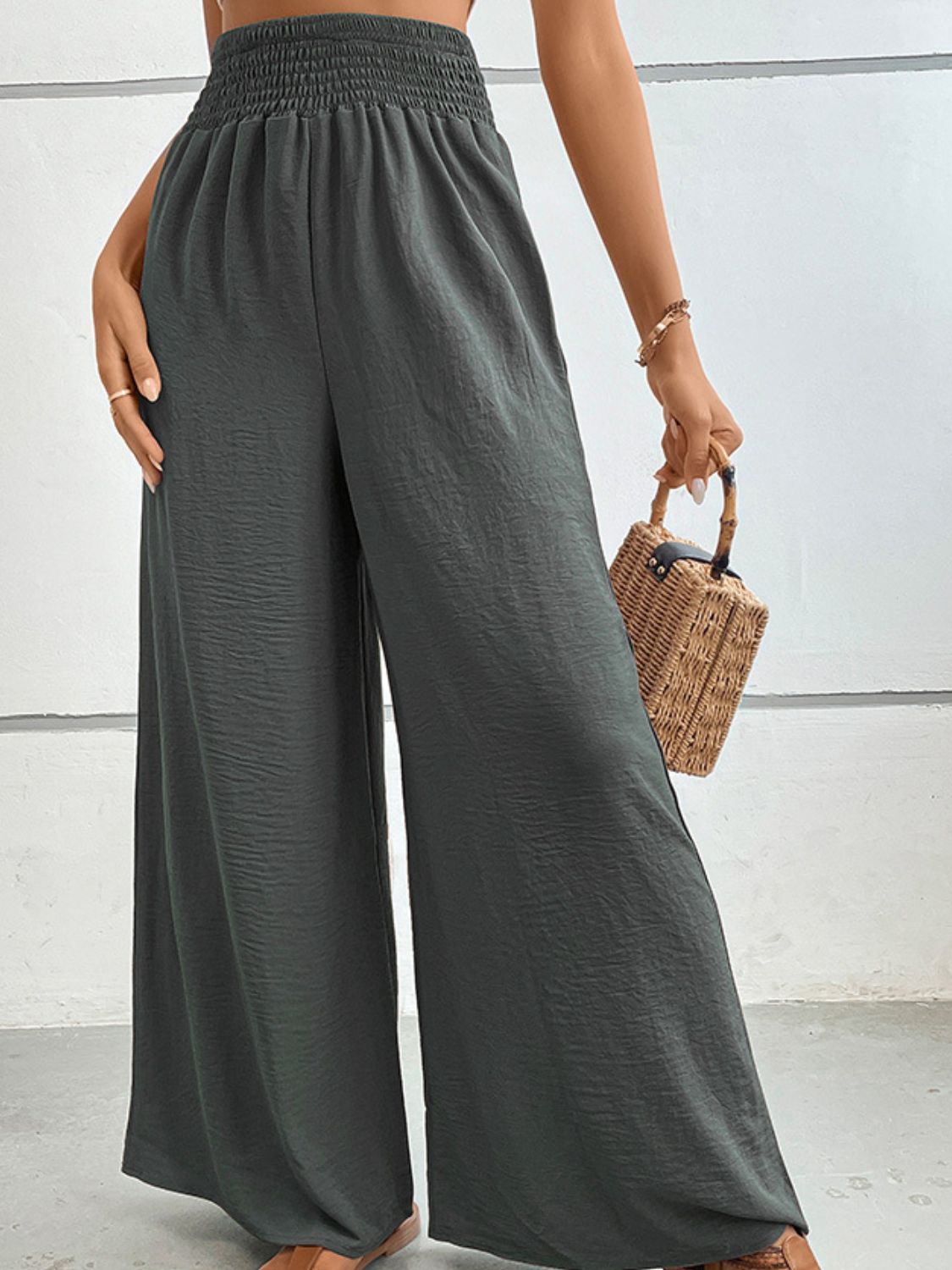 Dark gray wide-leg long pants with elastic waist and loose, wide legs