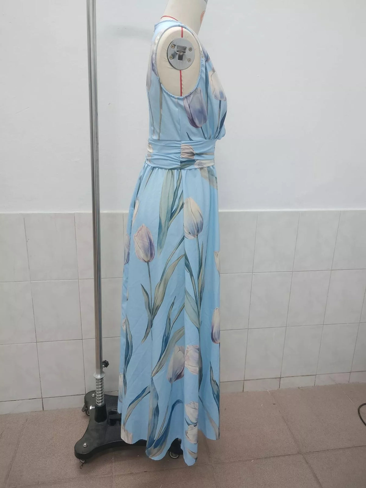 Sky blue floral maxi dress on hanger, sleeveless V-neck with ruched waist