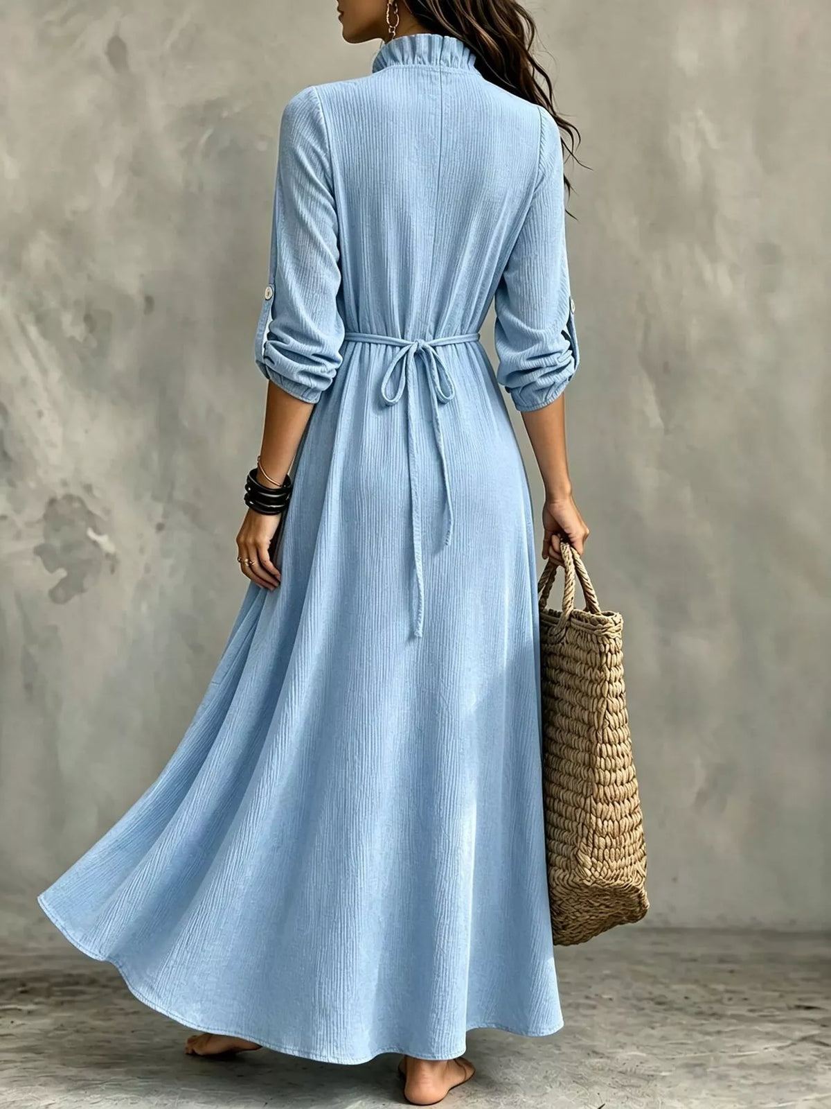 Sky blue maxi dress with 3/4 sleeves and tie waist on the back