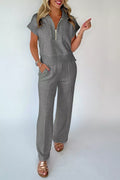 Dark gray half-zip polo tee and matching wide-leg pants set, short sleeves.