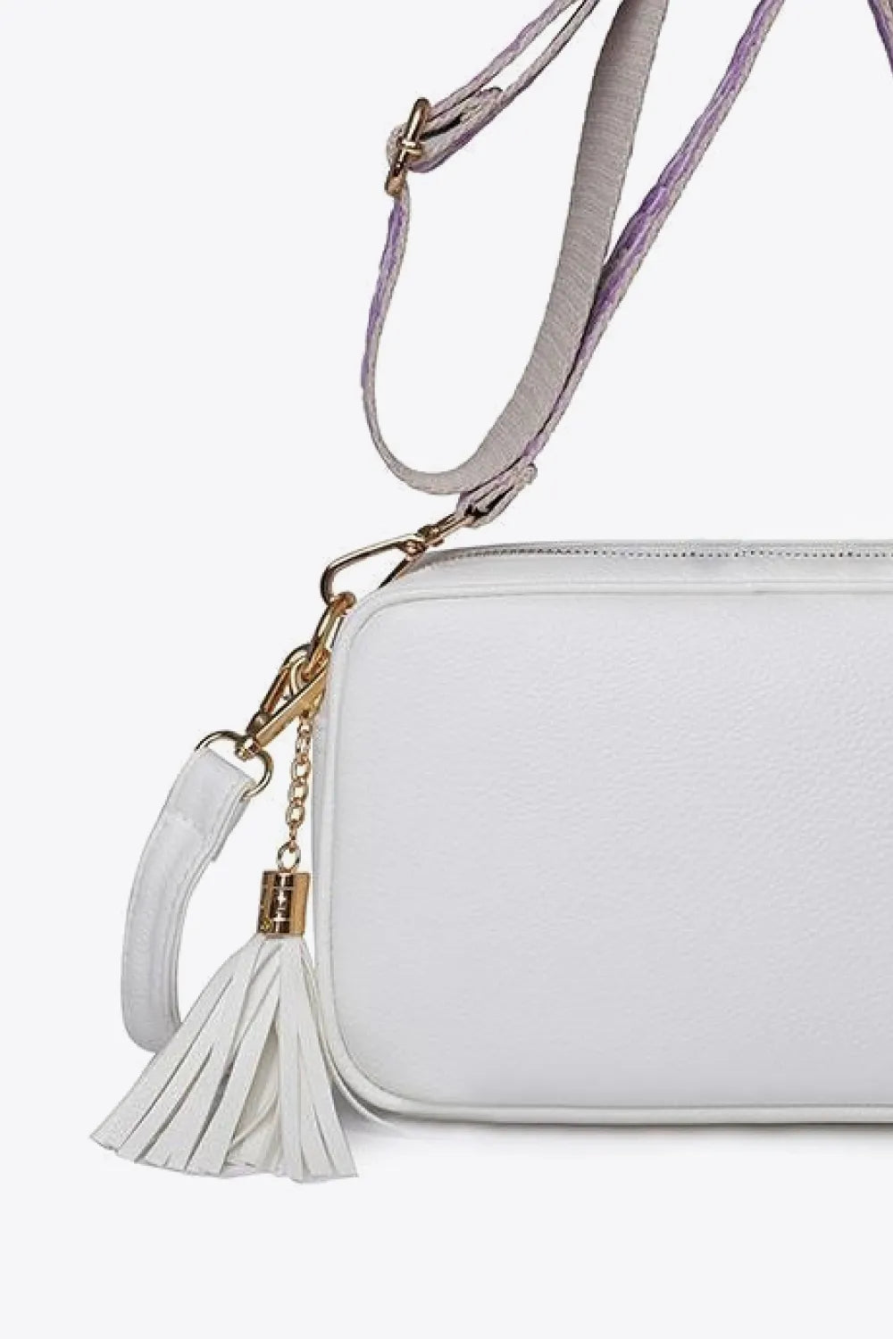 Tassel crossbody bag, white PU leather, gold zipper, charm lock and long strap