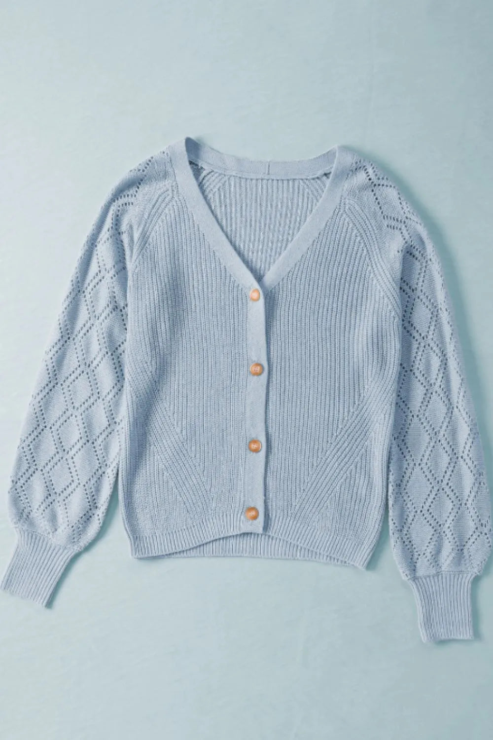 Light blue openwork V-neck button-front cardigan sweater with long sleeves