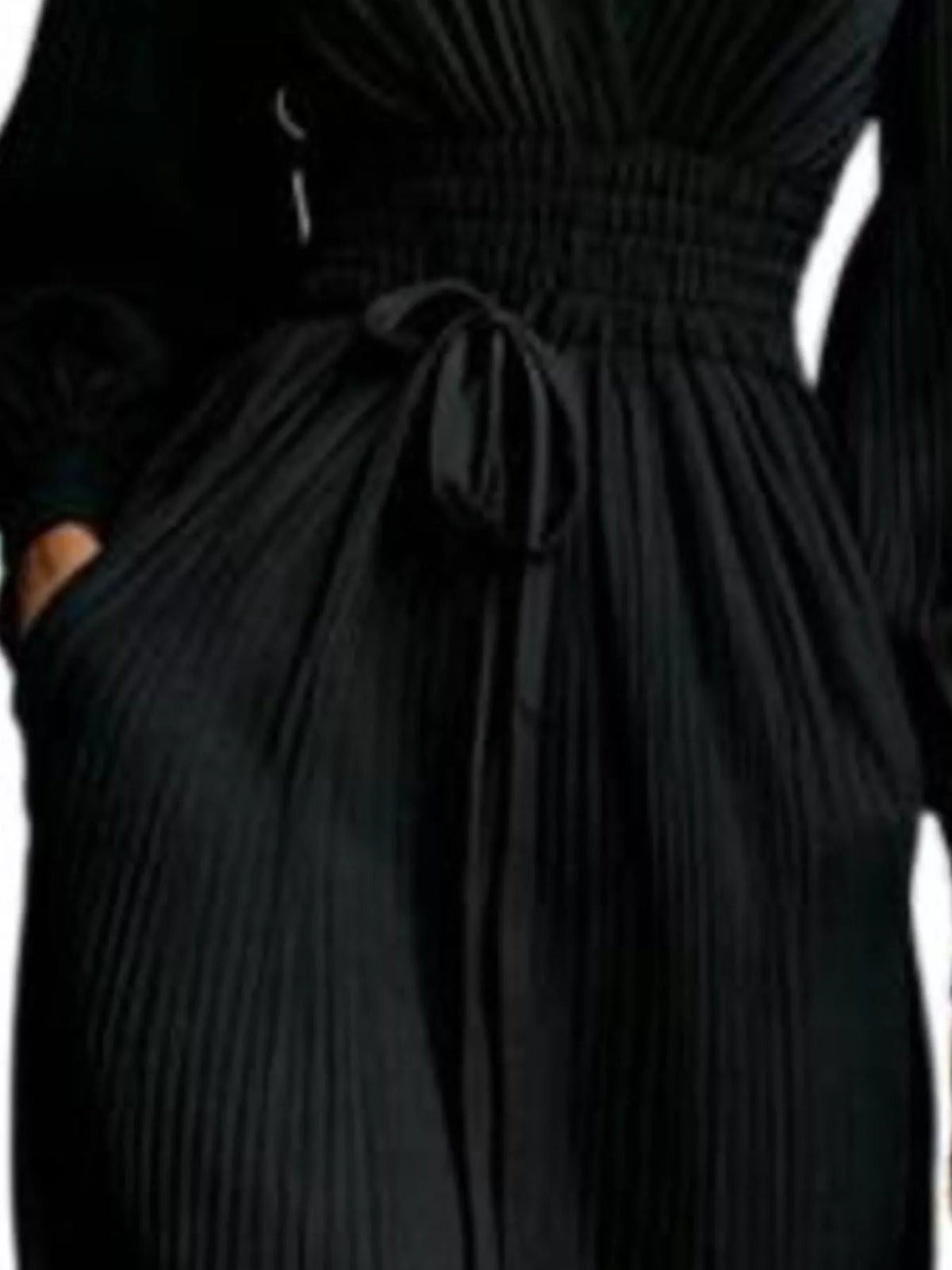 Black pleated tie-waist maxi dress bodice and bow detail close-up