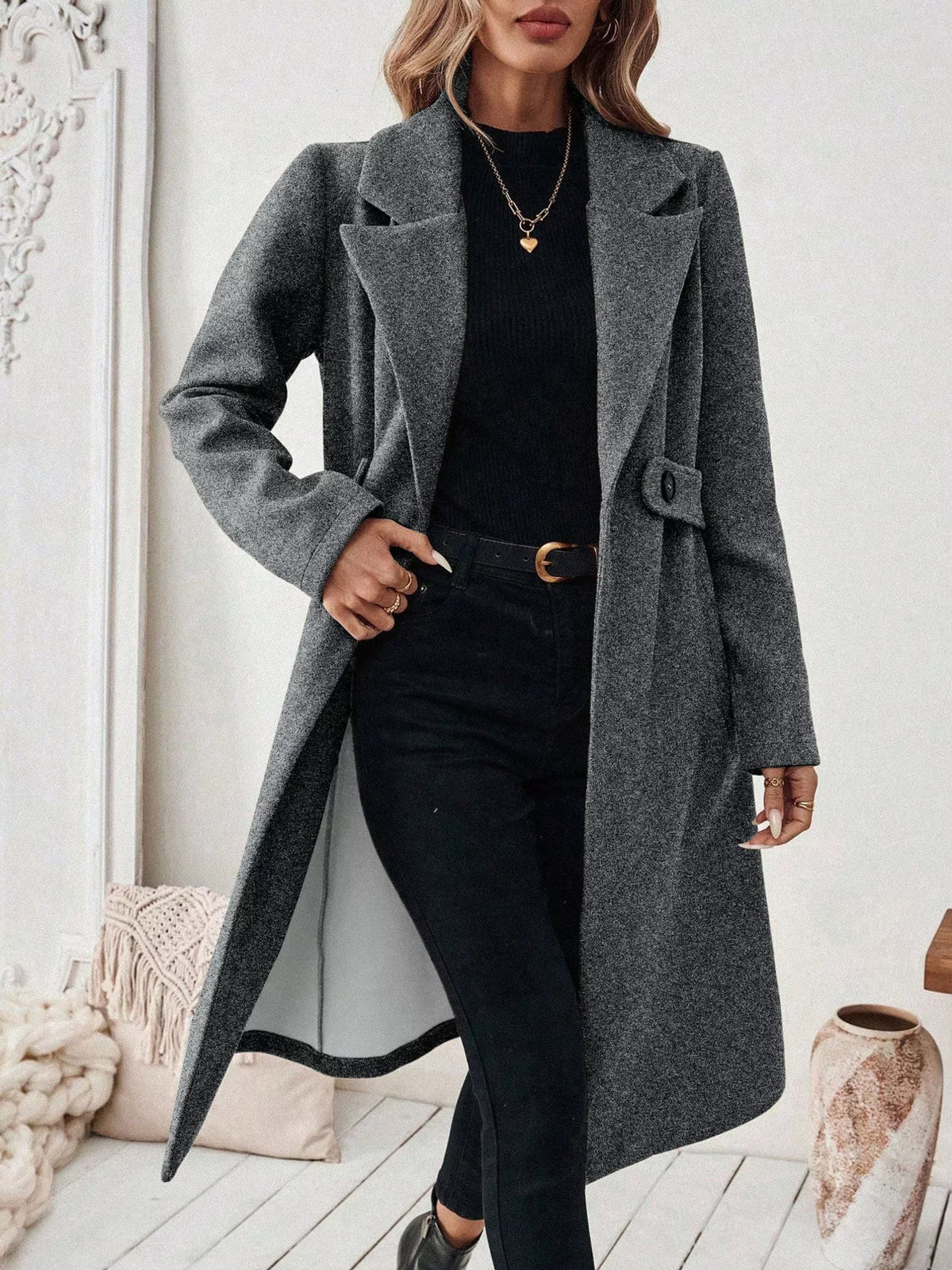 Dark gray longline winter coat with lapel collar, button-front and side pockets