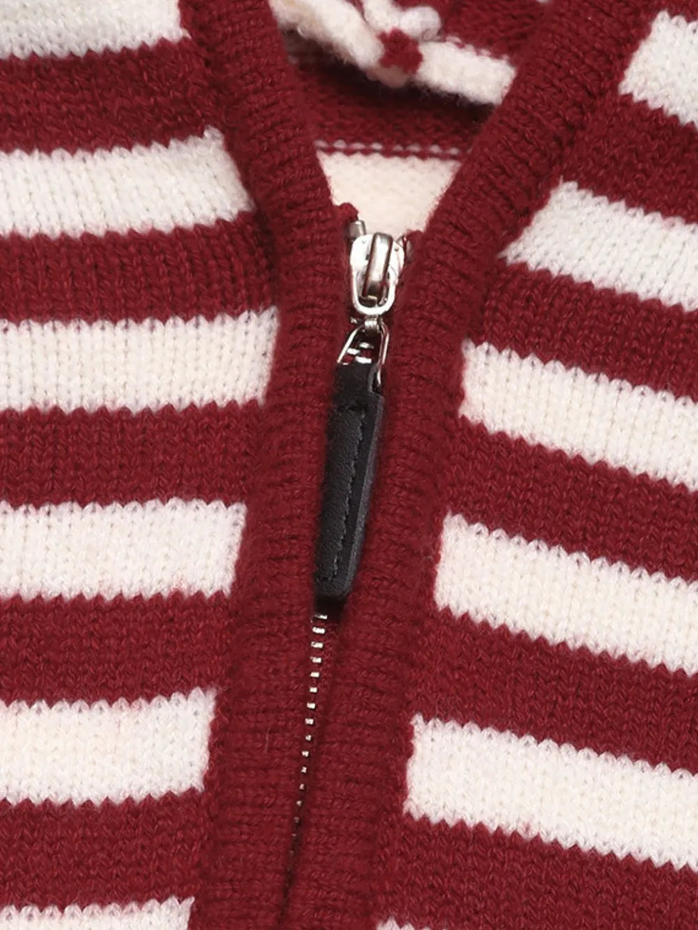 Burgundy-and-white striped sweater zipper with metal pull and hood placket