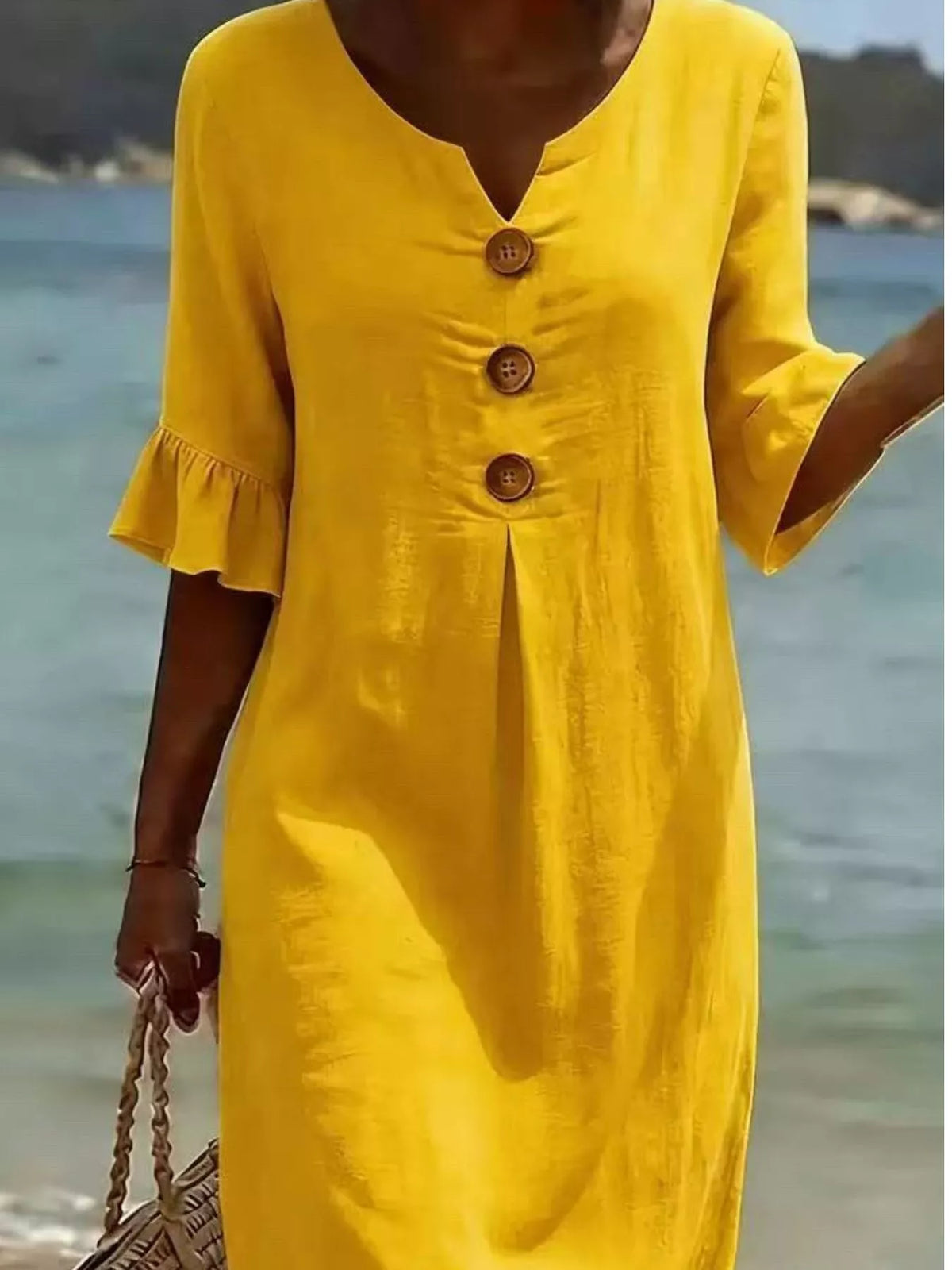 Yellow button-front ruffle half-sleeve dress with V-neck and three dark buttons