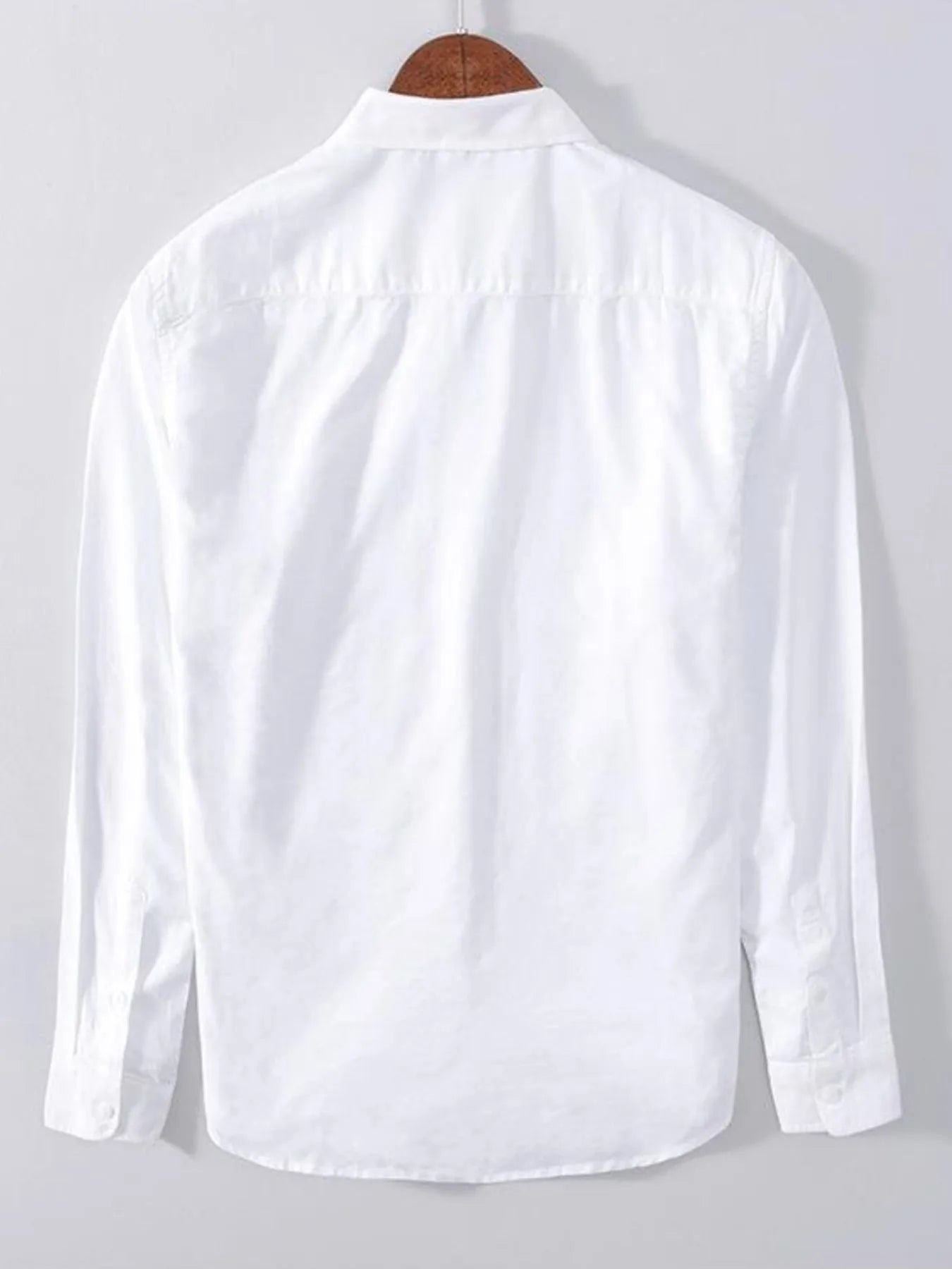 Plus size button-up long sleeve shirt, white back view with rounded yoke seam