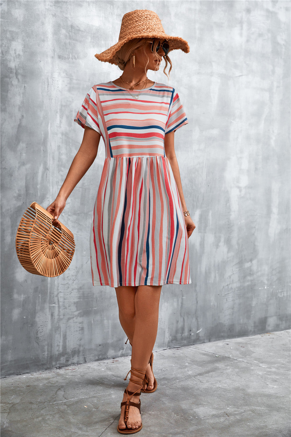 Striped round-neck dress with short sleeves and gathered waist, vertical multi-color stripes