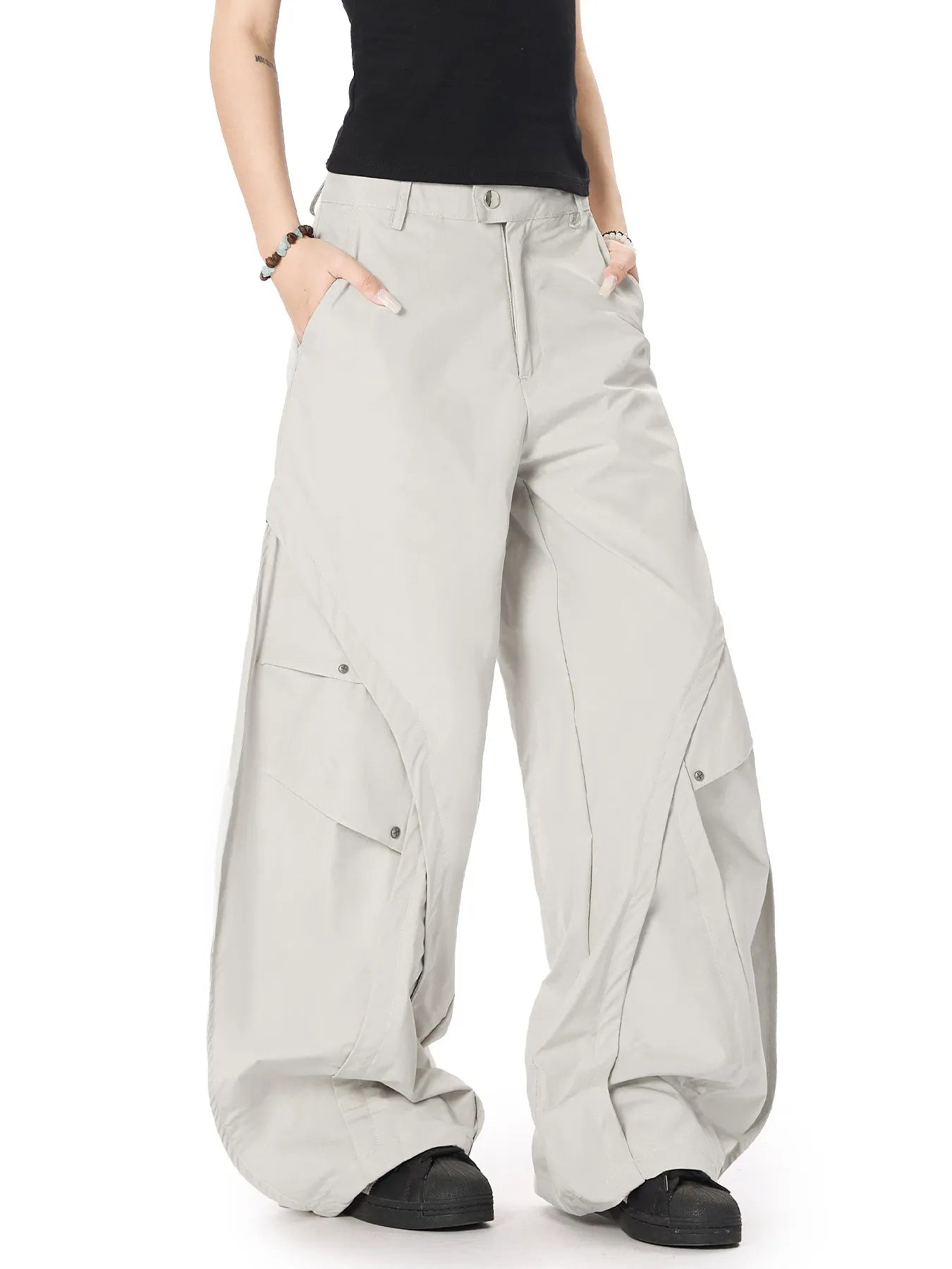 Light gray oversized wide-leg cargo pants with flap pockets and belt loops