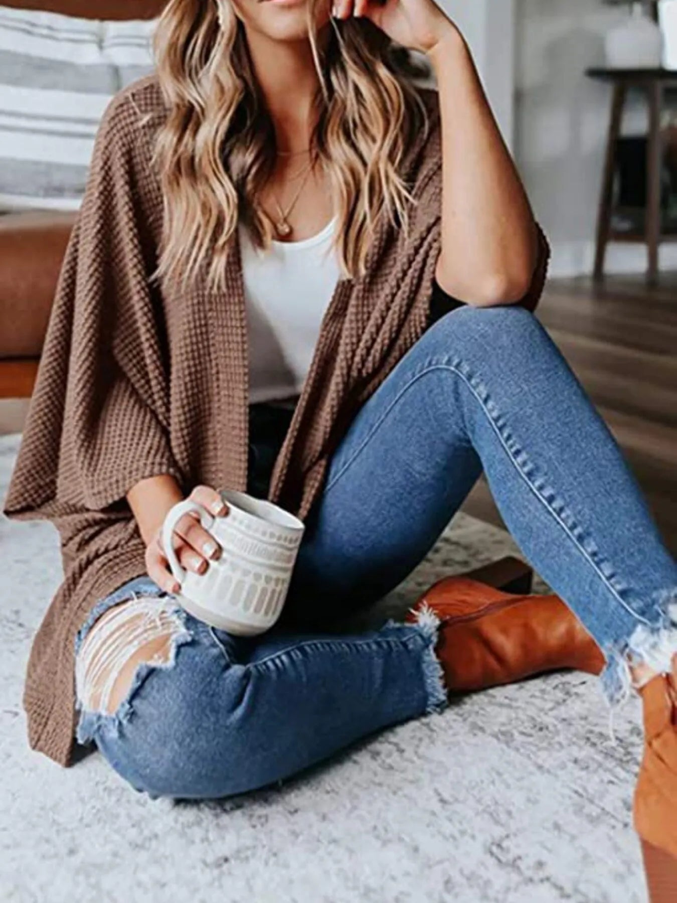 Taupe waffle knit open-front cardigan with draped plus-size fit, worn over a white top