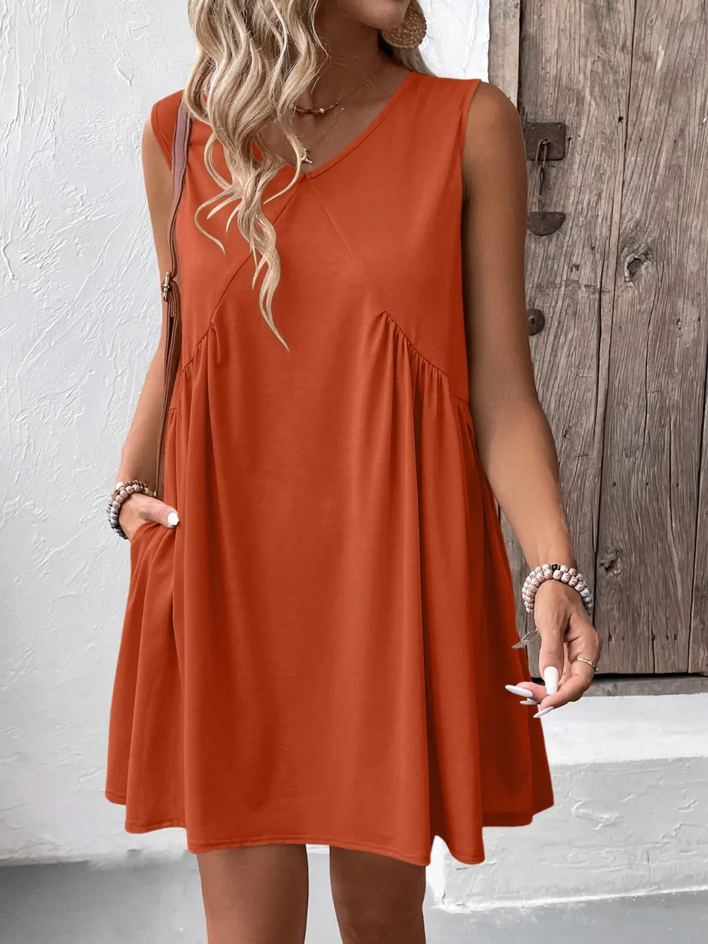 Ivy Lane Ruched V-Neck Sleeveless Mini Dress in rust-orange