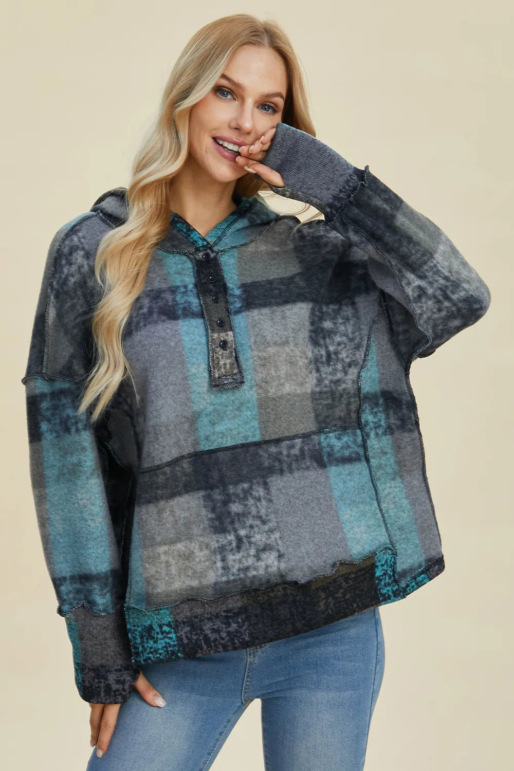 Multicolor plaid fleece hoodie with hood and half-zip placket, 3/4 front view
