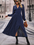 Dark blue V-neck long sleeve pleated dress with ruched waist and side slit