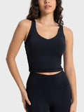 Black cropped sport tank with V-neck and fitted waist seam