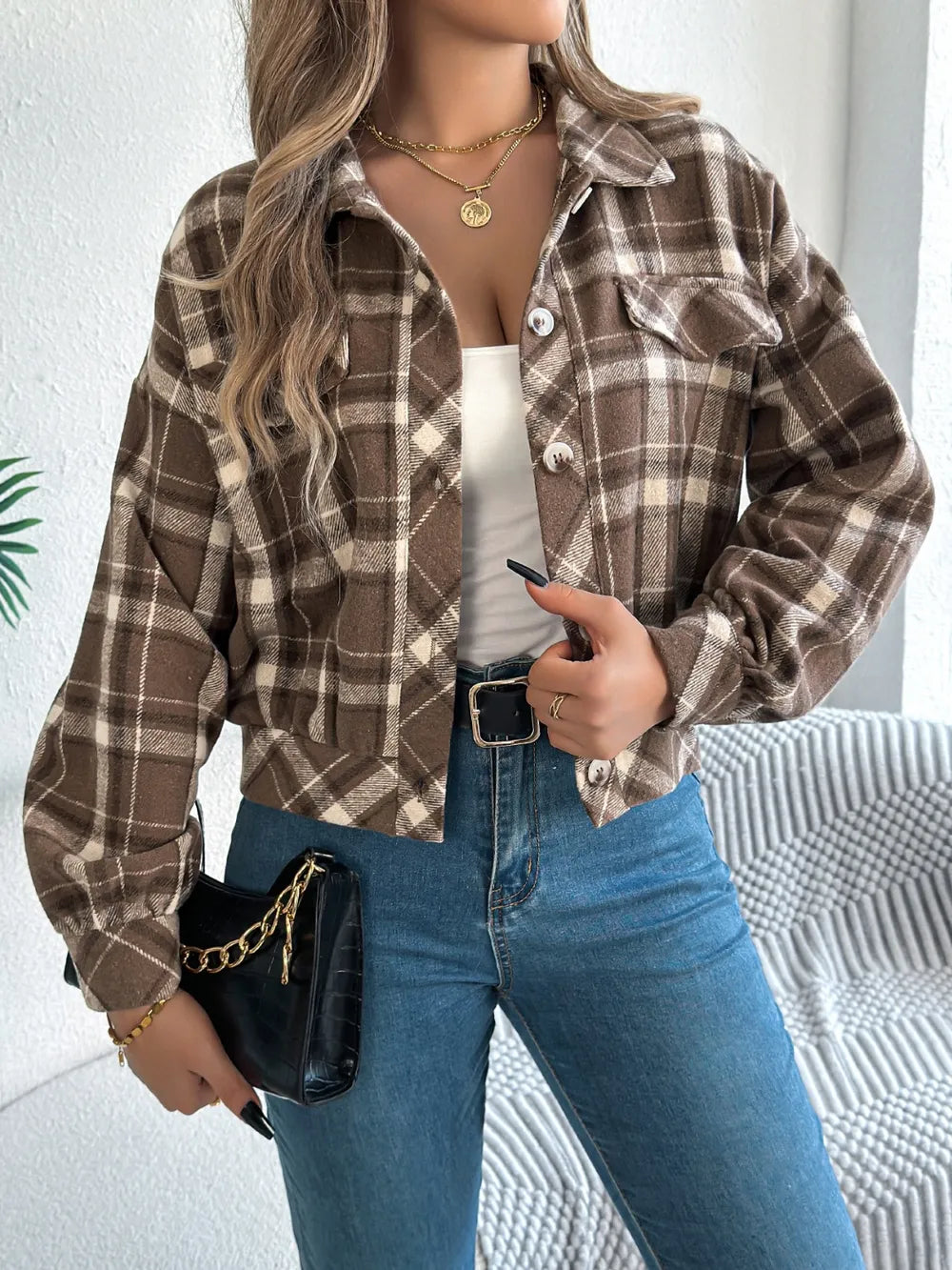 Plaid button-up long-sleeve jacket with flap pockets and button front