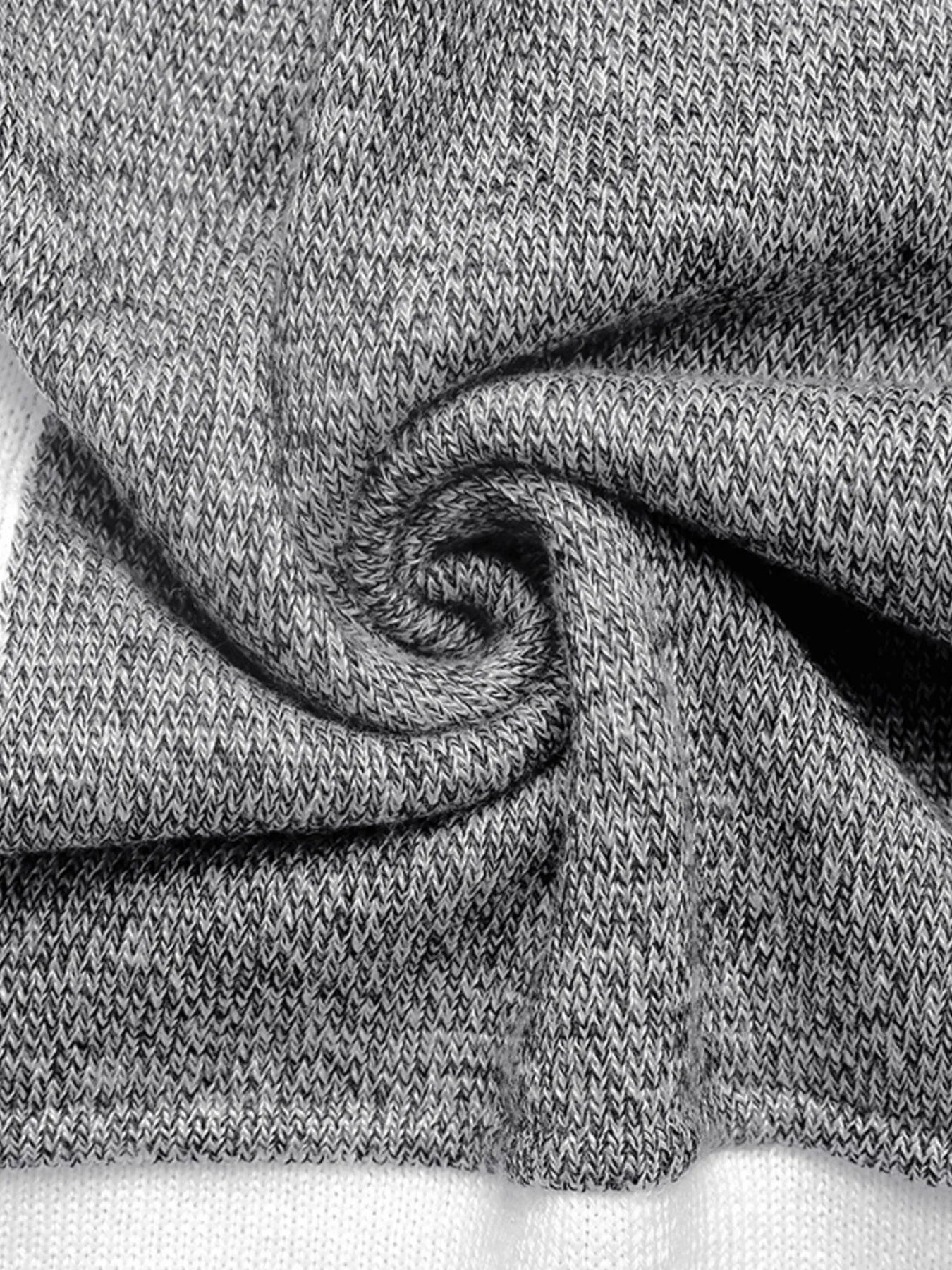 Heather grey knit fabric with visible texture and soft drape