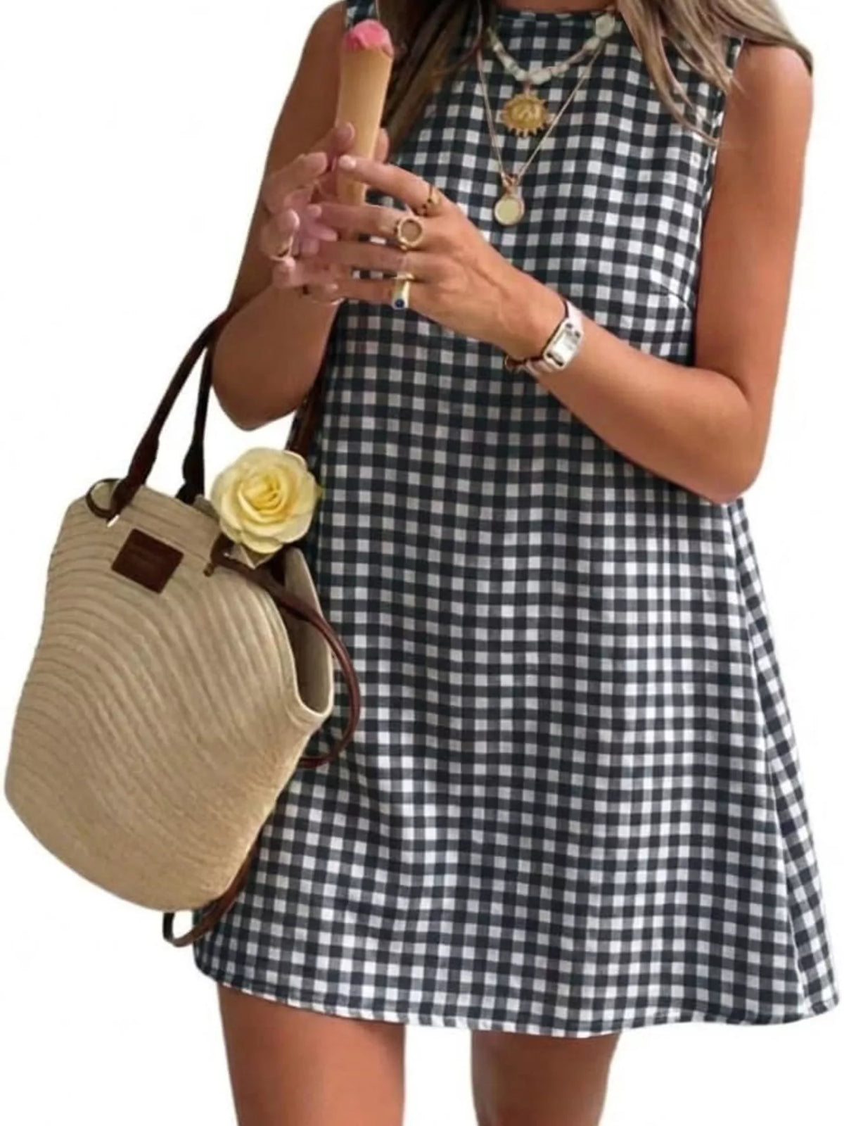 Black and white gingham sleeveless A-line mini dress with round neckline
