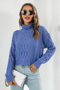 Blue cable-knit turtleneck sweater with dropped shoulders and long sleeves