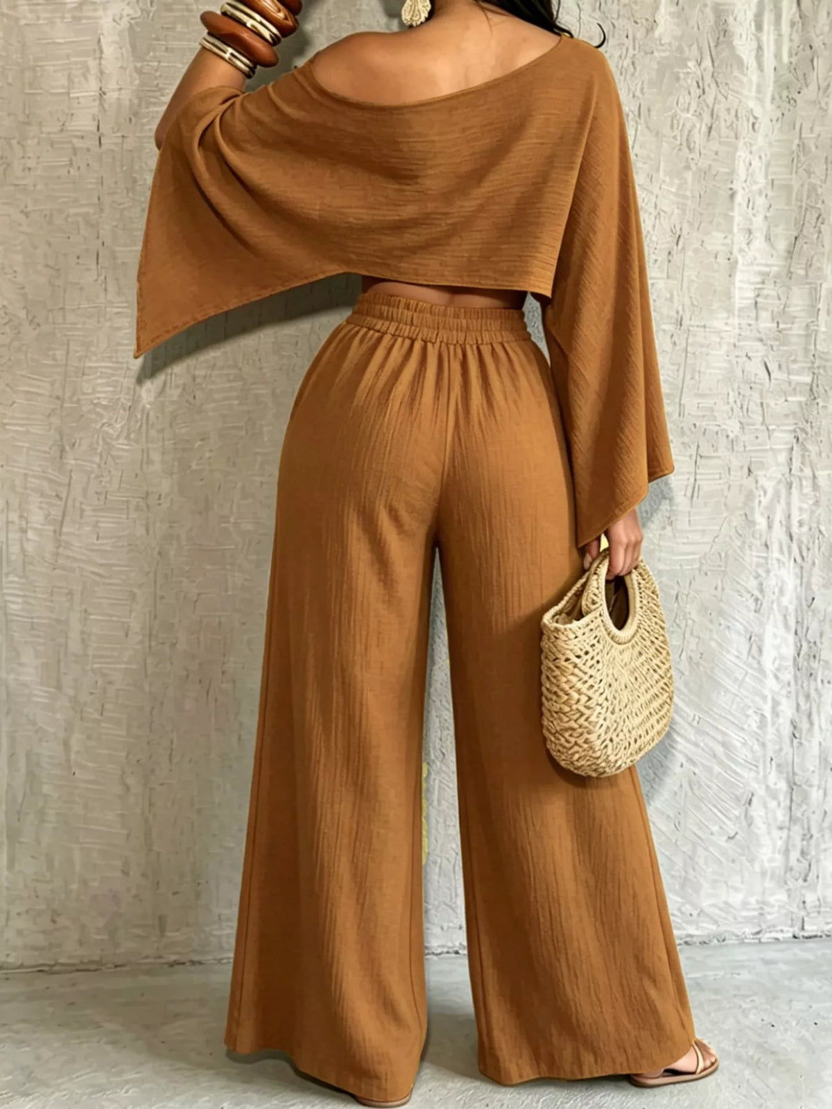 Brown boat-neck crop top and wide-leg pants with gathered waist