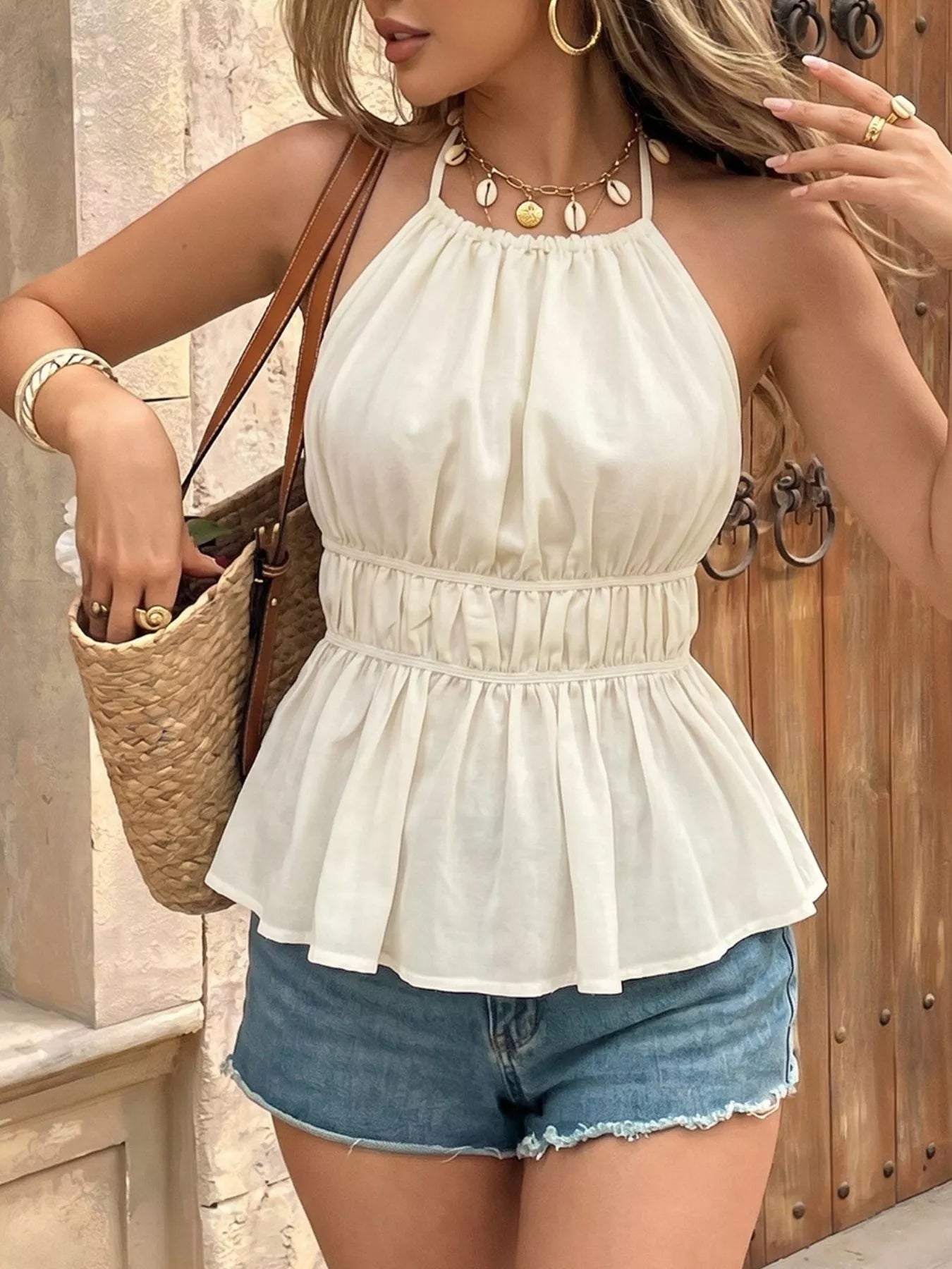 Cedar & Moore Halter Neck Cami in white with a smocked waist and flowy peplum hem