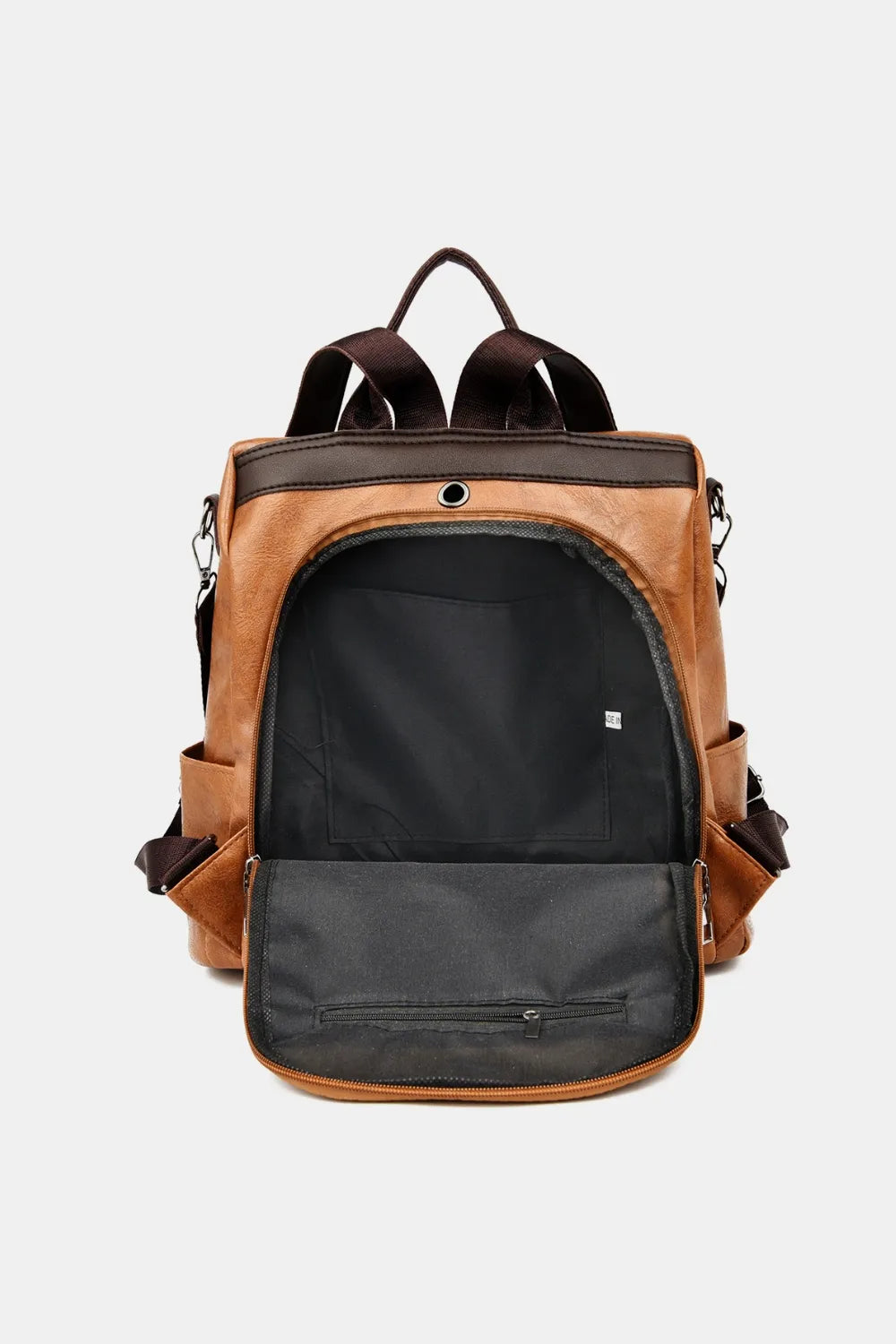 Caramel backpack bag with front pocket opening and double top handles