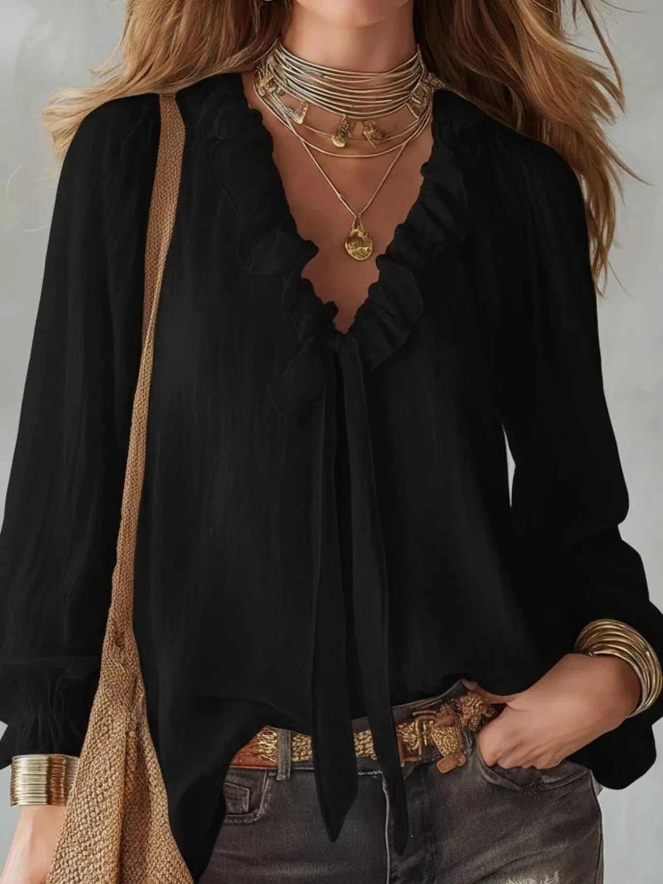 Black ruffle long-sleeve blouse with deep V ruffle trim and loose sleeves