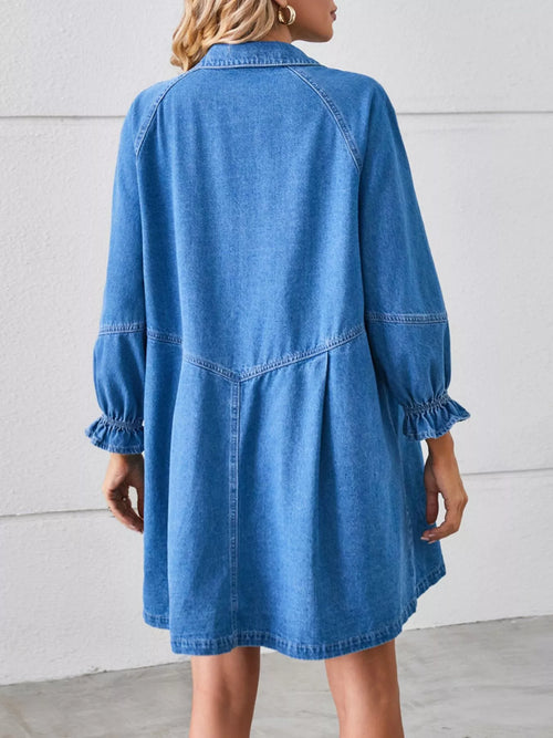 Blue denim shirt dress back with yoke seams and gathered elastic cuffs