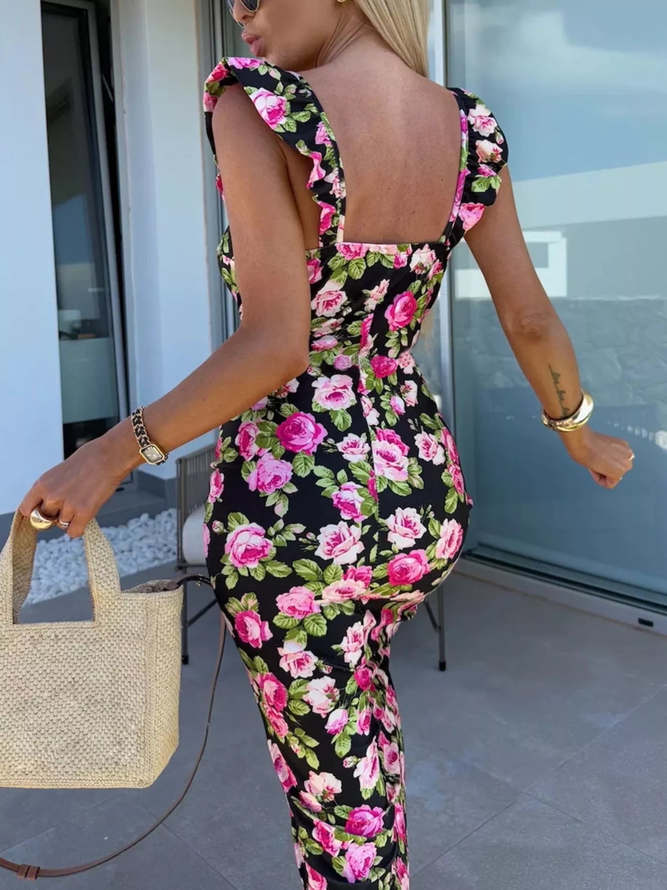Black floral midi dress with square back, thin straps, and front side slit
