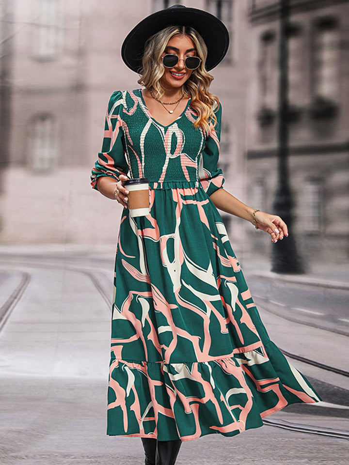 Mid green printed smocked V-neck midi dress with three-quarter puff sleeves