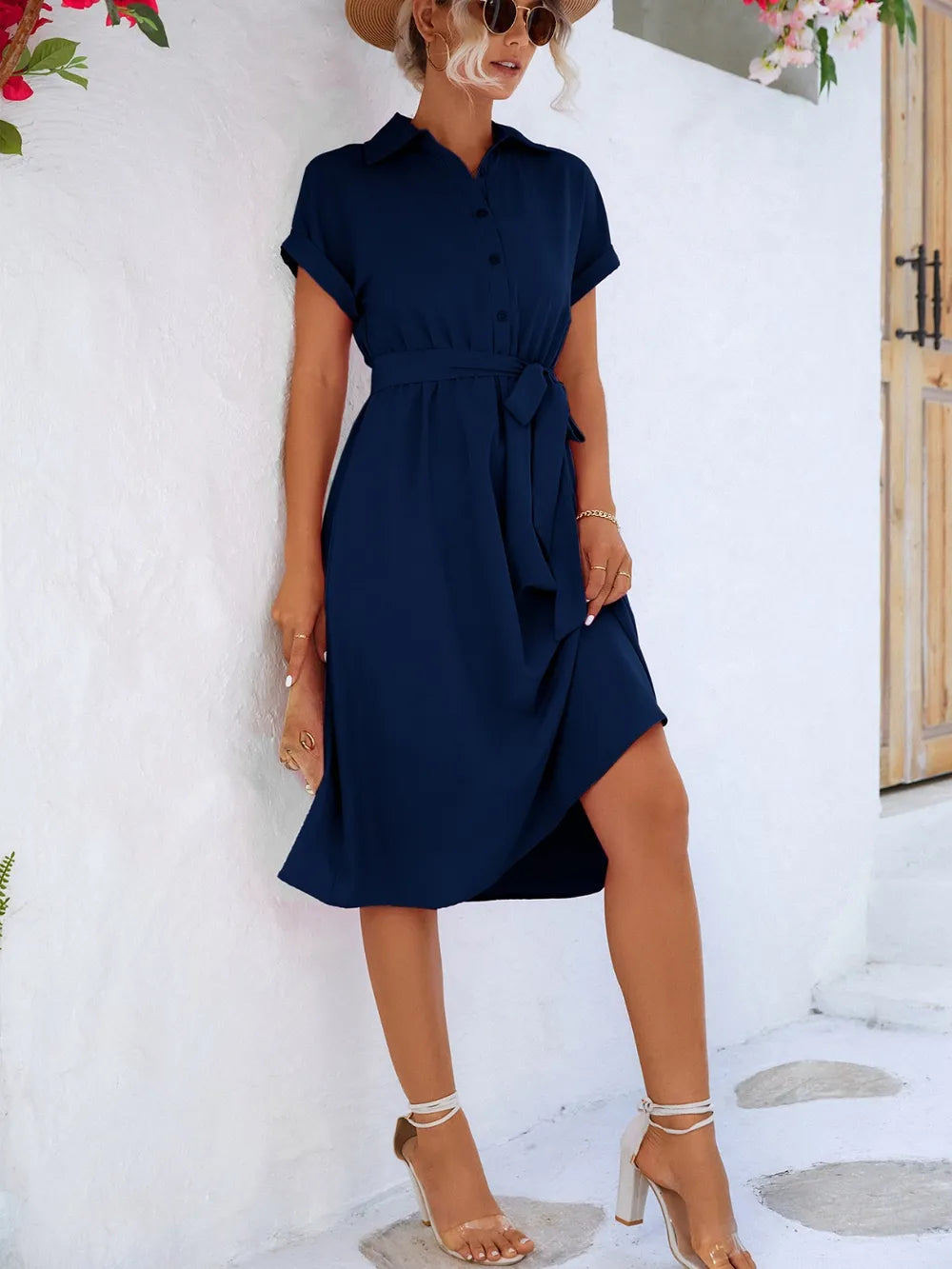 Dark blue buttoned tie-waist short-sleeve dress with gathered skirt