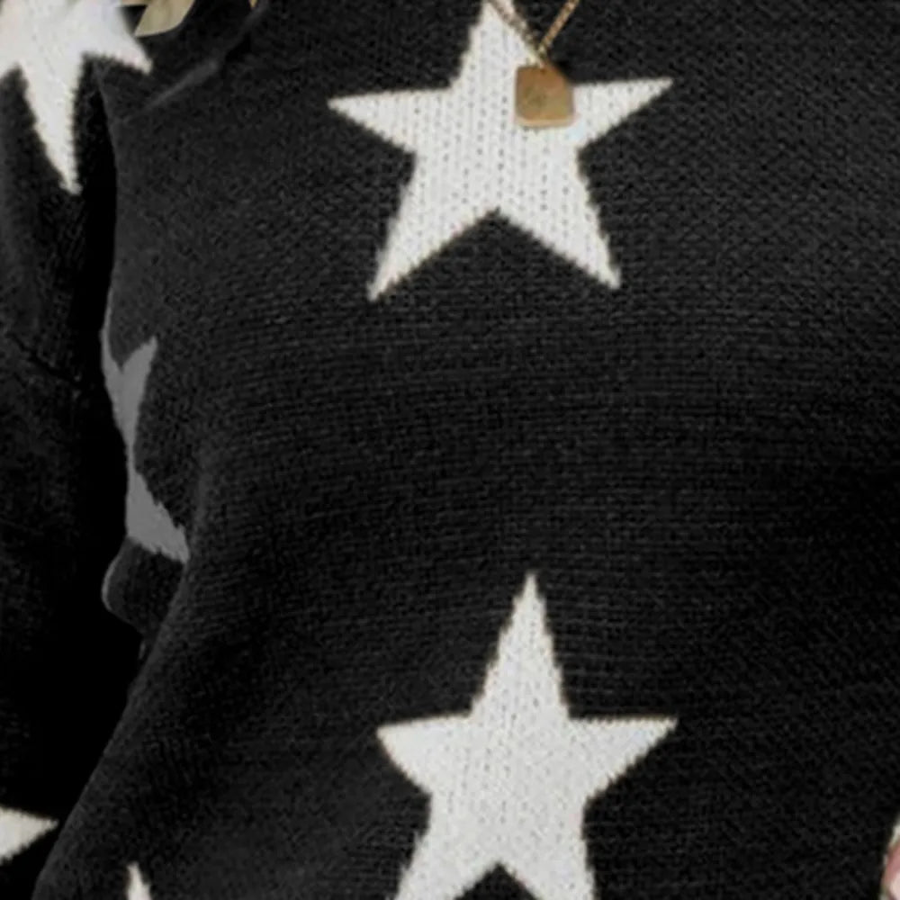 Black sweater with white star motif close-up on textured knit