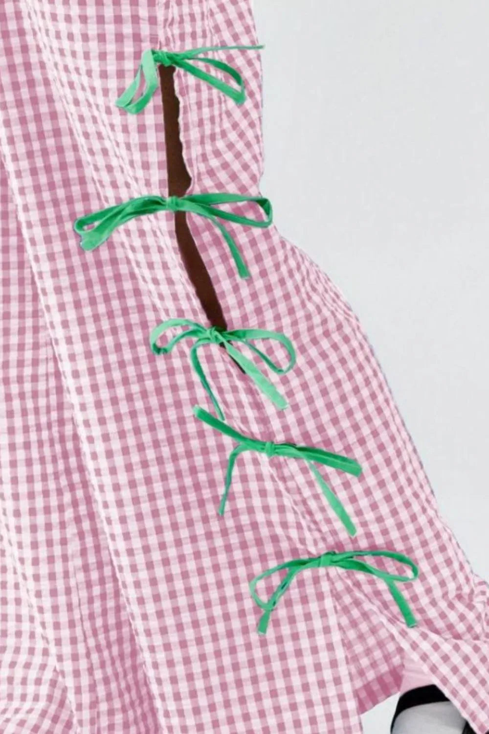 Pink gingham plaid pants with green side bow tie detail