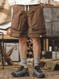 Brown men's cargo shorts with drawstring waist and multiple utility pockets